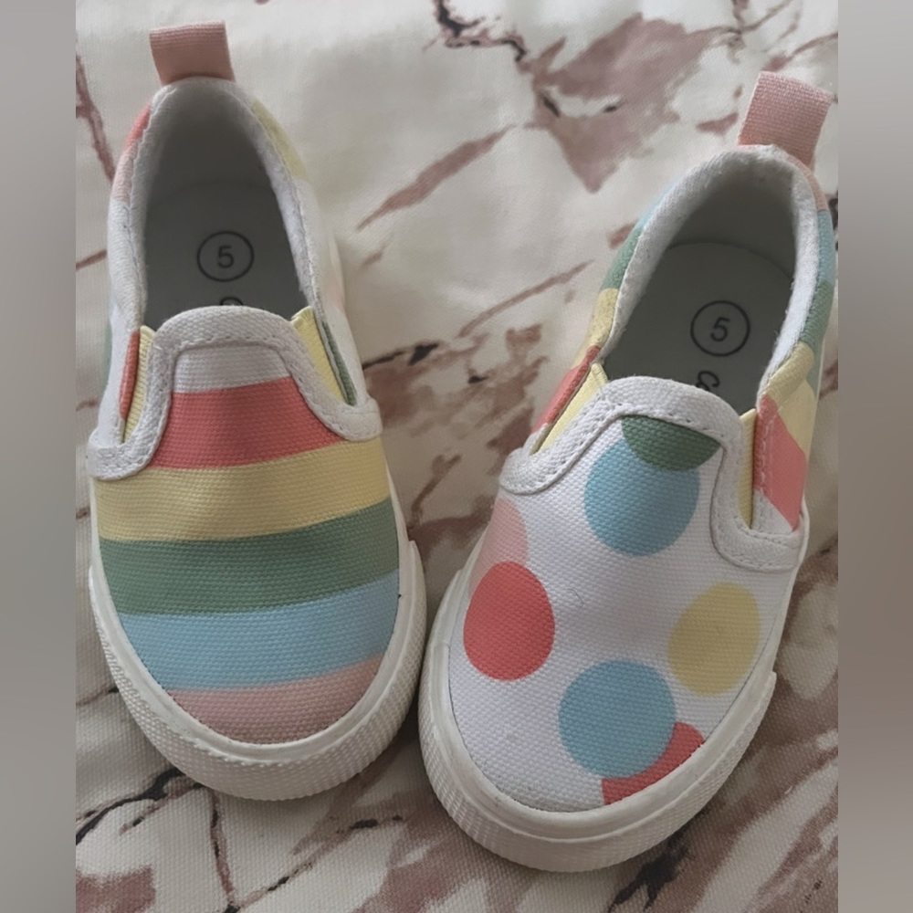 Multi colored cat & jack toddler shoes. These are so adorable and hardly used!